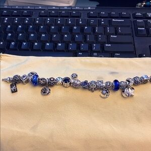 Pandora bracelet with blue and silver moon and stars theme